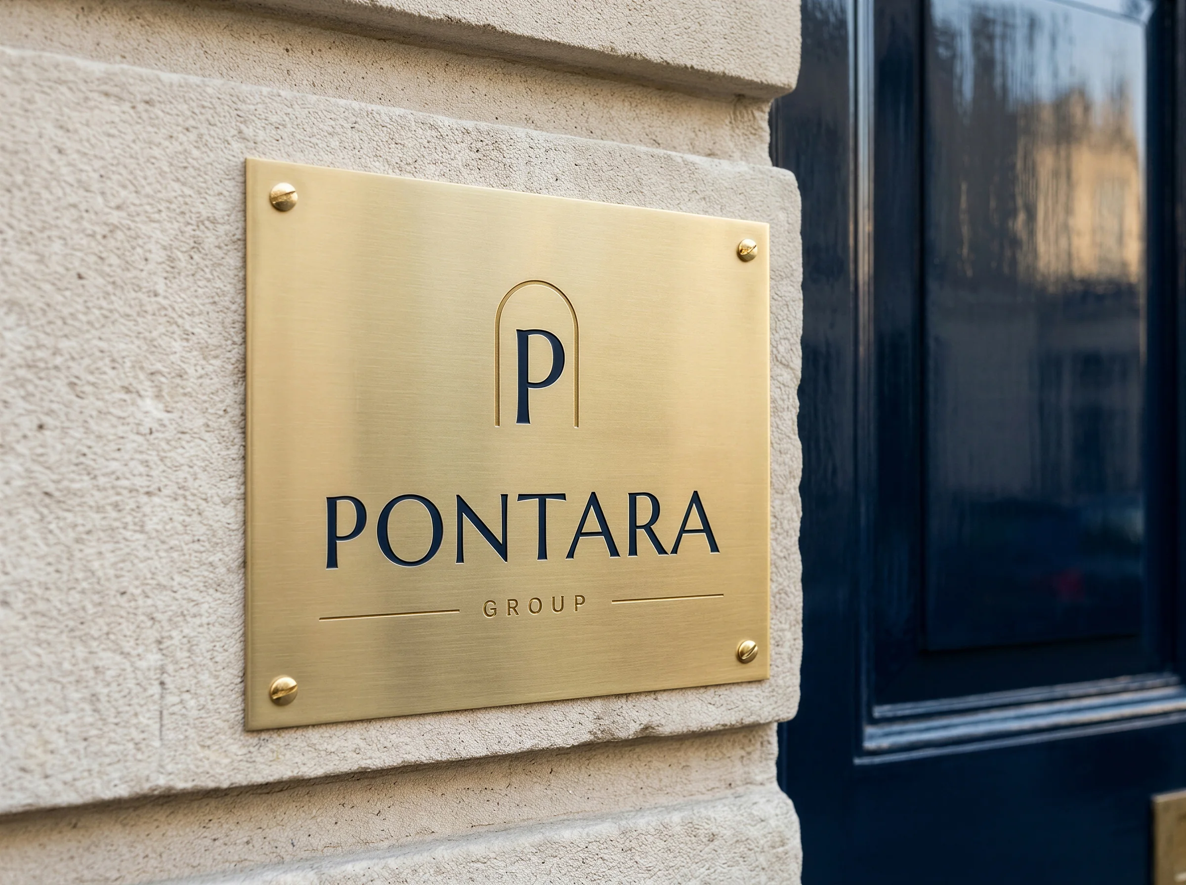 A brass plaque engraved with the Pontara Group logo beside a navy door